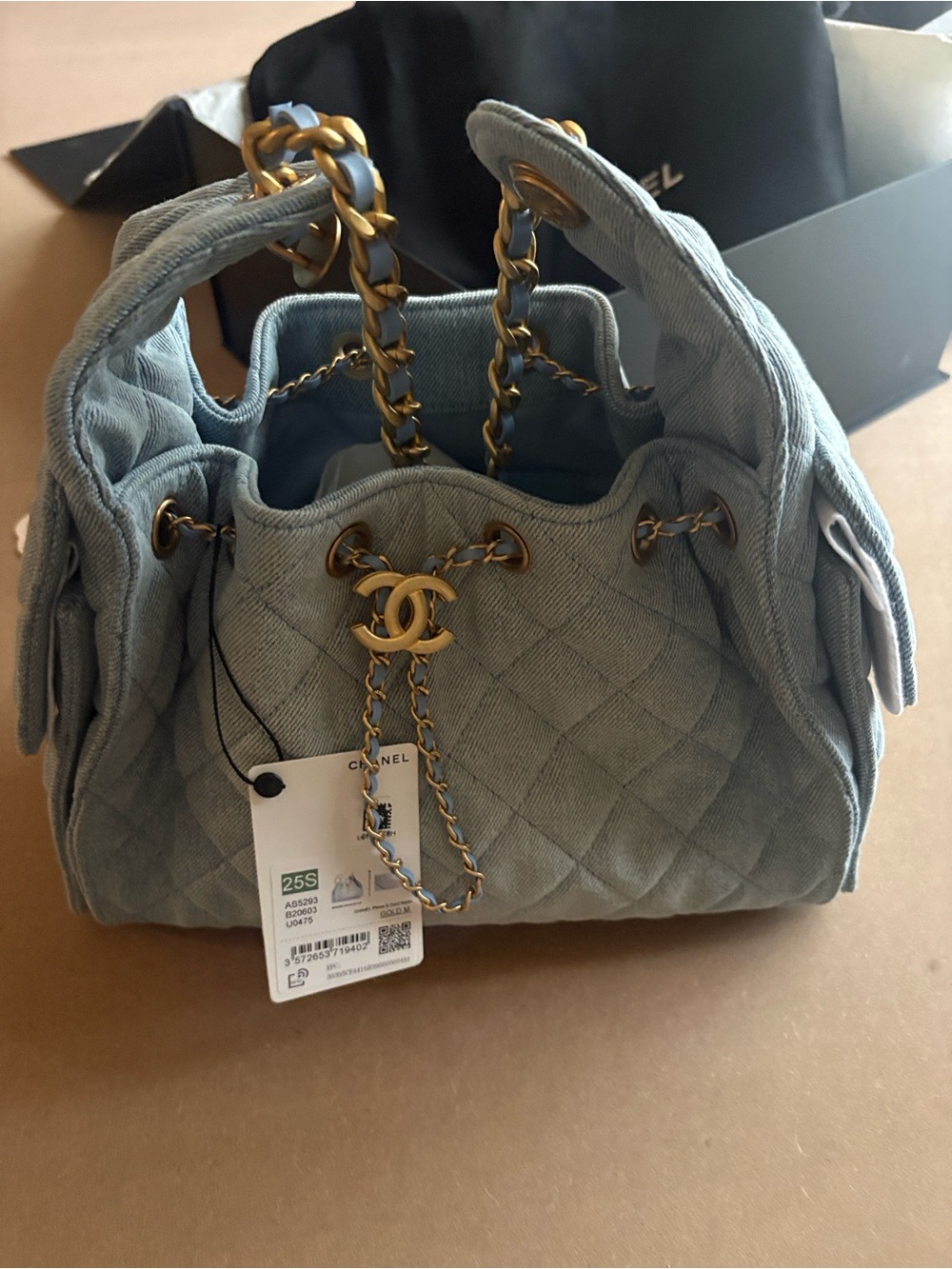 CHANEL 25 Drawstring Shoulder Bag in Denim with Gold Hardware - Picture 1 of 5